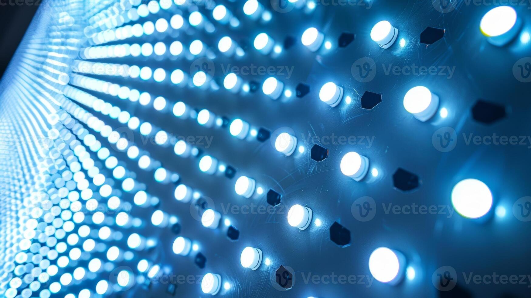 Detailed texture of an LED light panel showcasing the tiny chips and diodes that create the bright pixels and the smooth surface of the panel photo