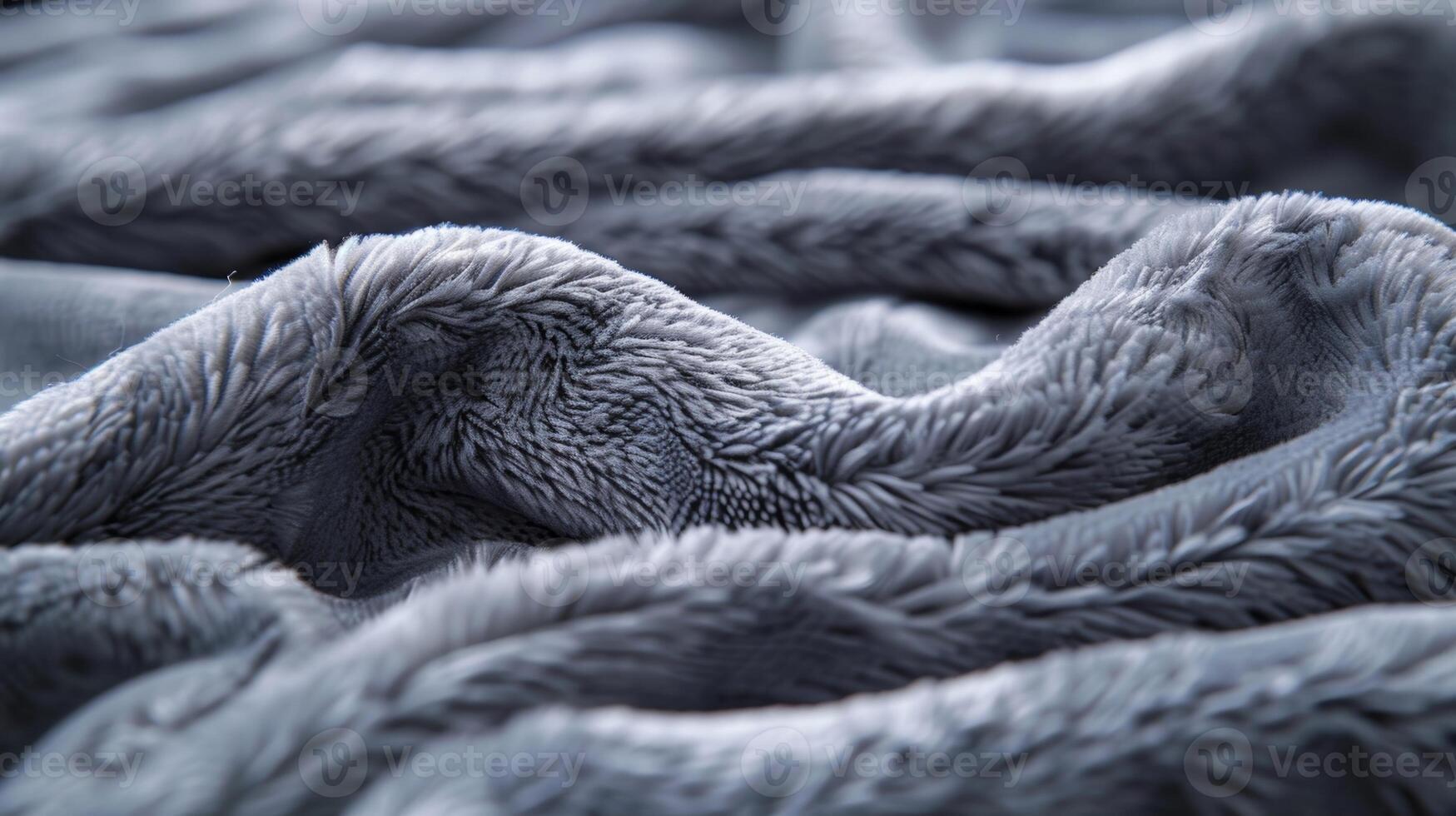As you run your fingers through the blankets surface you feel the gentle ridges and valleys of the thick fleece fabric adding to its softness photo