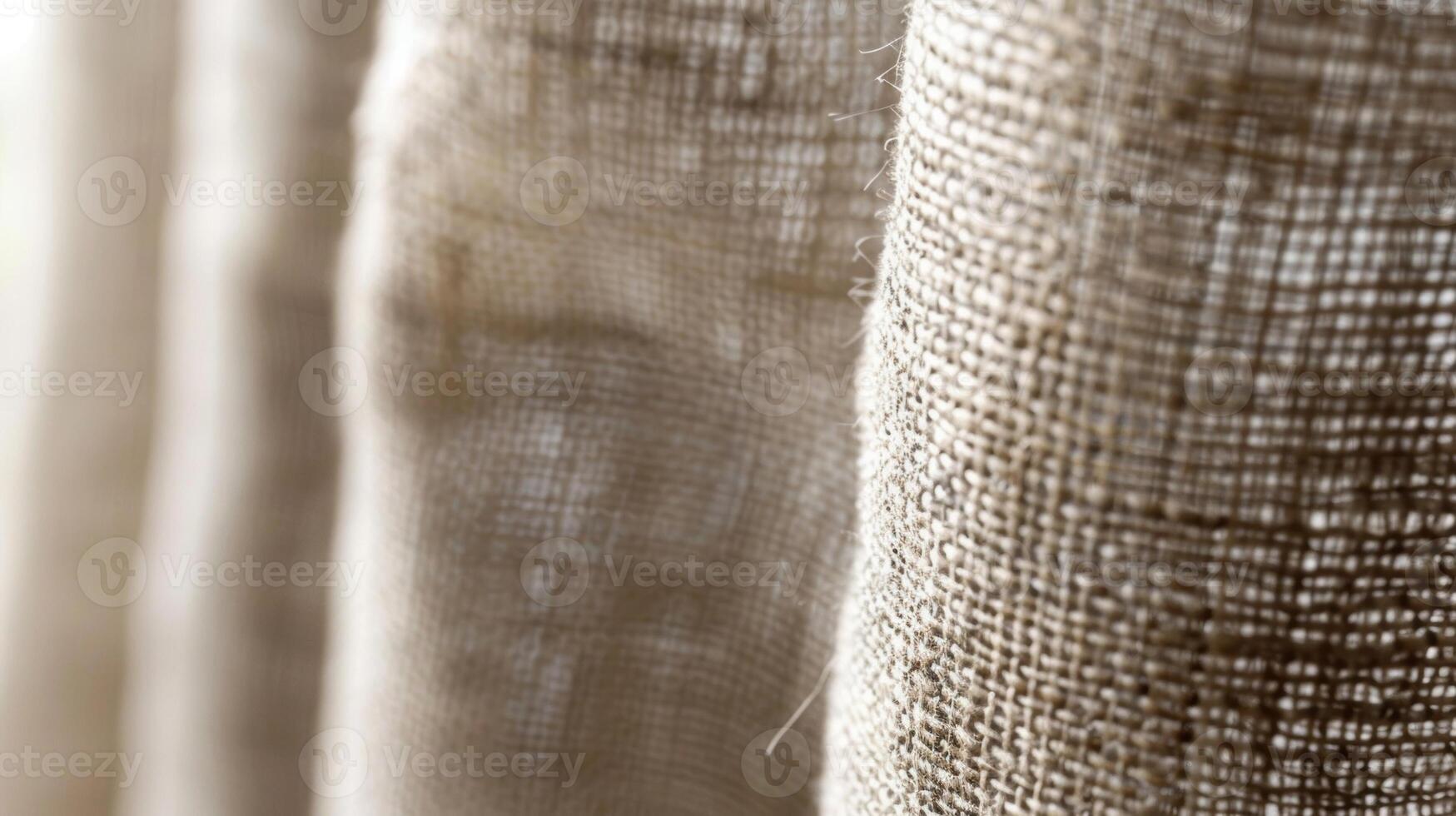 Fine Textured Weave The tightly woven texture of this linen curtain is highlighted in this closeup with tiny fibers creating a fine textured pattern that is pleasing to the touch photo