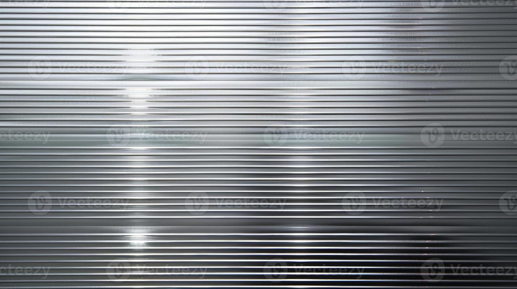 Tiny grooves and ridges create a subtle texture on this polished aluminum panel adding depth and dimension to its sleek appearance photo