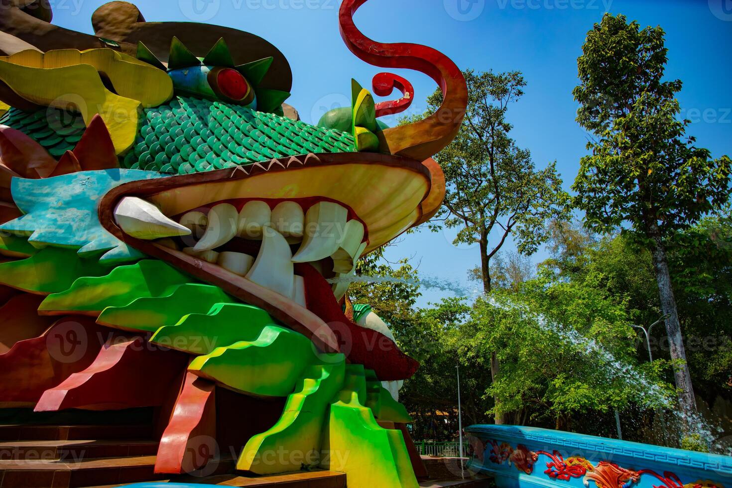 A big statue dragon at Suoi Tien park in Ho Chi Minh Vietnam closeup photo