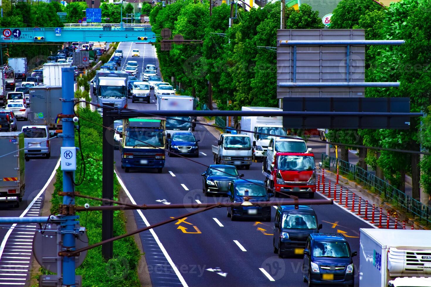 A downtown street at Kanpachi avenue in Tokyo daytime photo