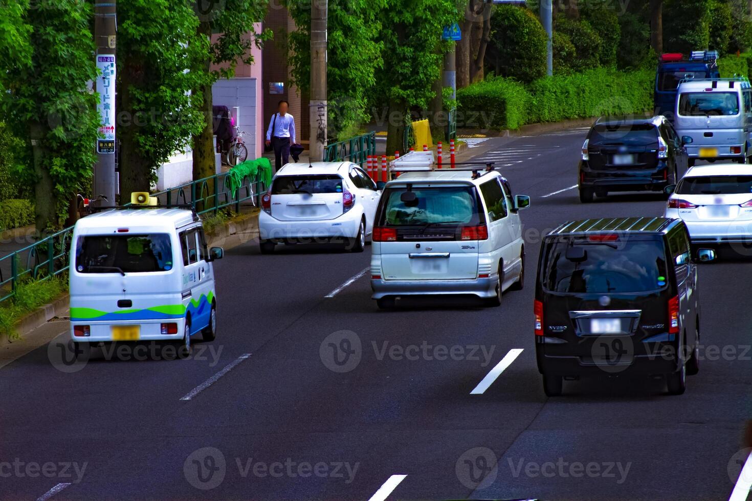 A downtown street at Kanpachi avenue in Tokyo daytime photo