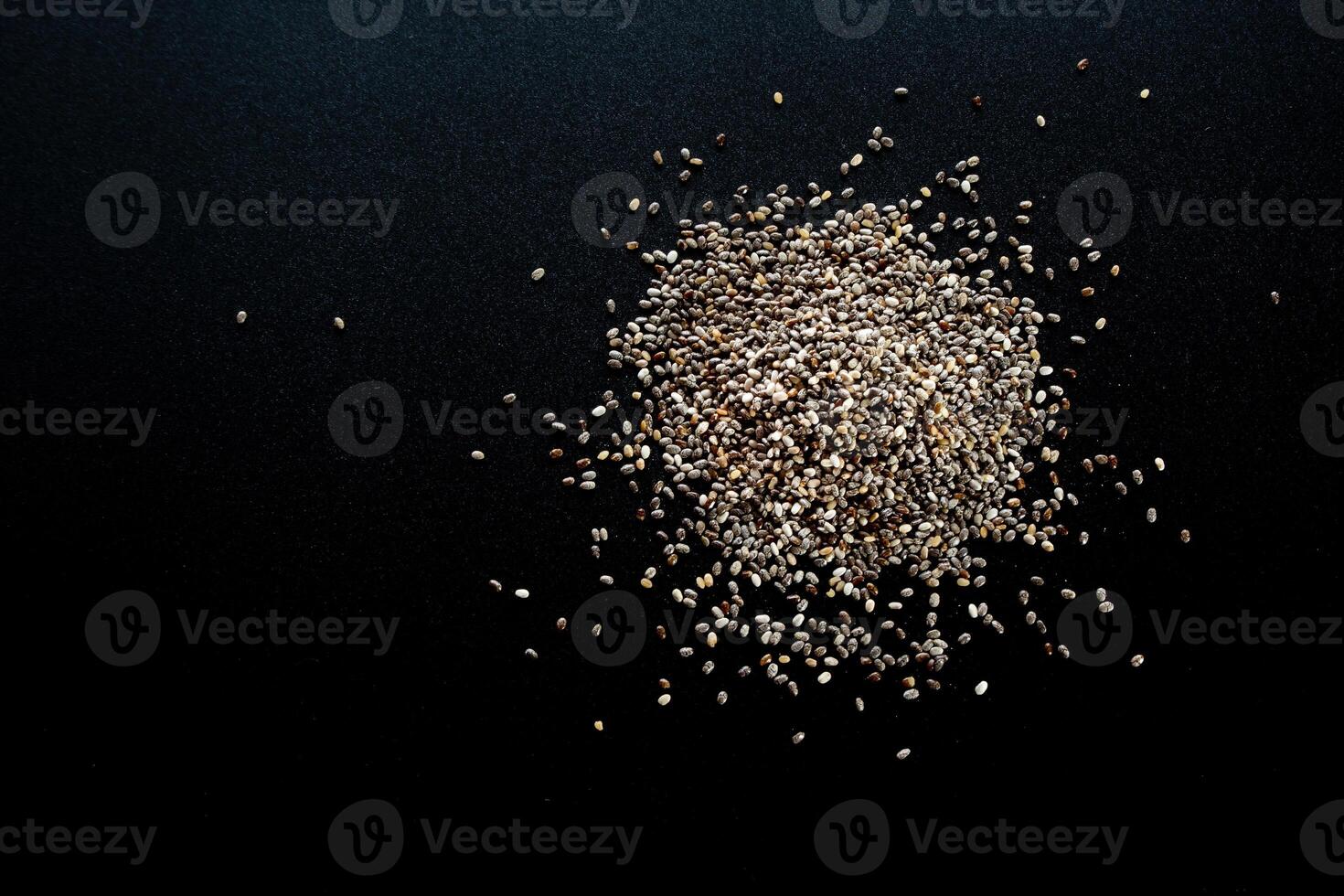 Chia seed on black background photo