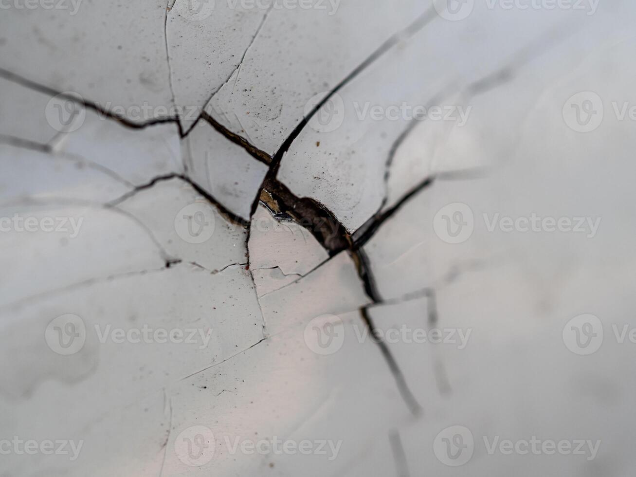 Extreme dents and Paint cracks are dislodged from parts of the accident car photo