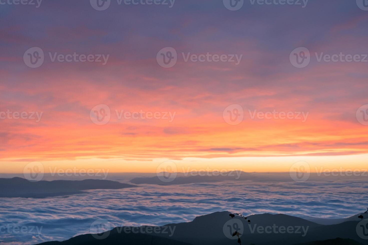 Beautiful Clouds Over the Mountains Create a Harmonious Atmosphere, Painting a Serene and Majestic Scene of Natural Beauty photo