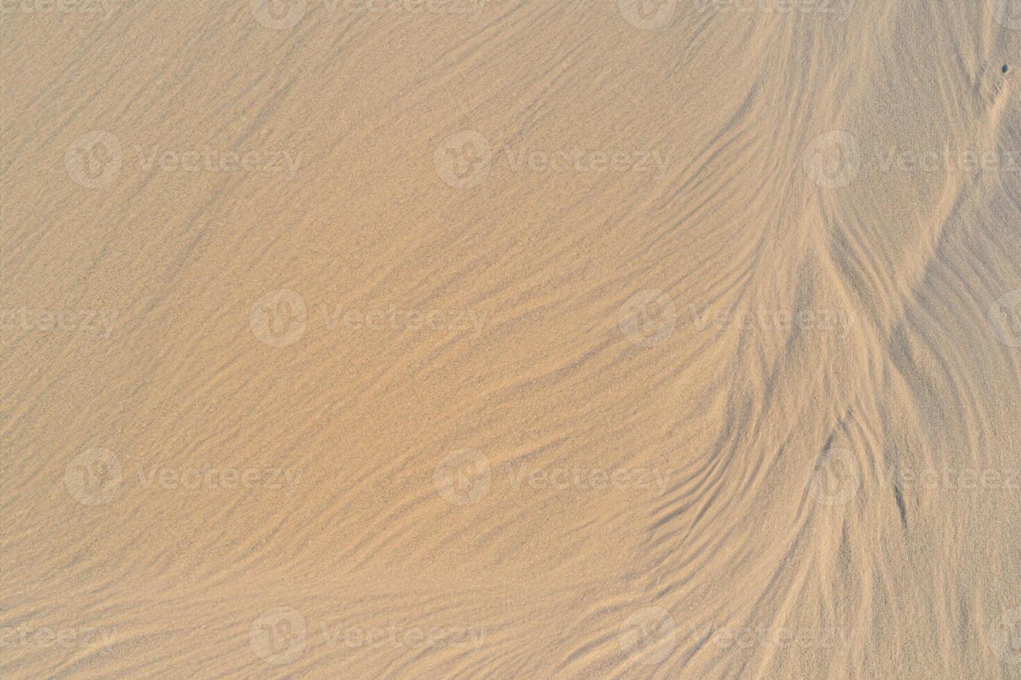 Beholding the Beauty of a Beach with Natural Motif Sands from Above, a Serene Coastal Vista photo