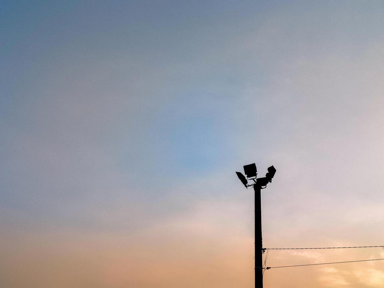 spotlight pole with sky background photo