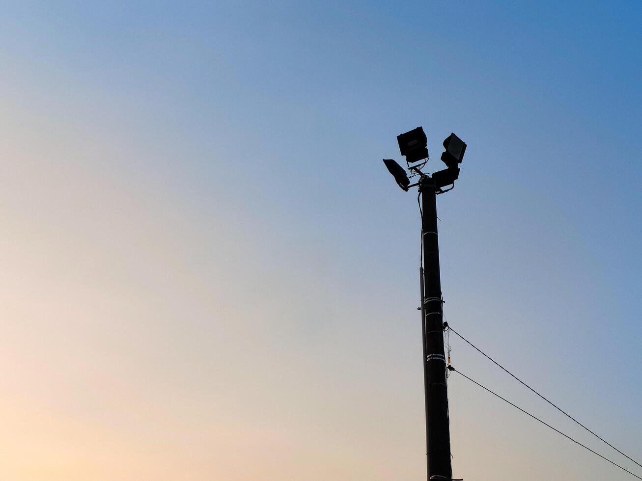 spotlight pole with sky background photo