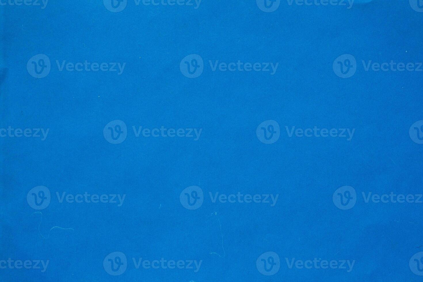 Blank blue craft paper texture as background, copy space photo