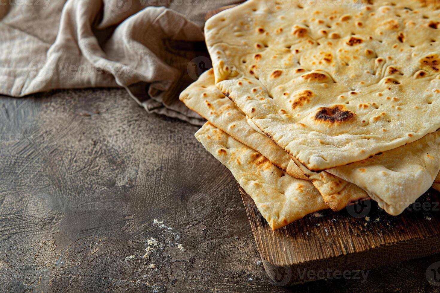 Flatbread on a sandy to earthy gradient background, connecting with themes of tradition and rustic dining photo