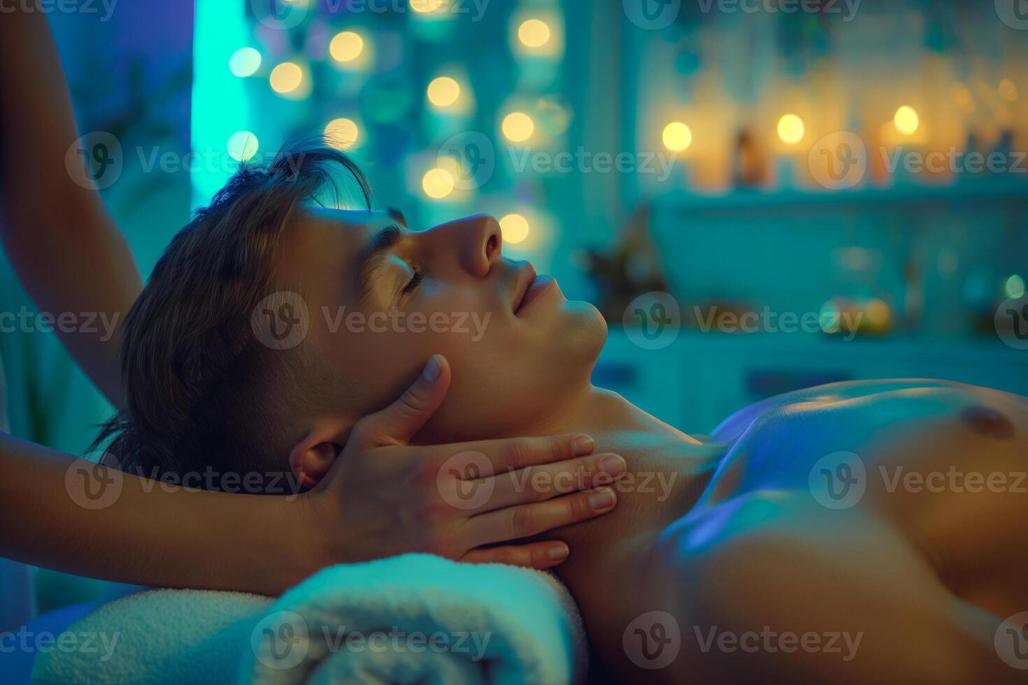 Young man in a spa salon, wearing a face mask, serene expression, dim lighting, relaxing ambiance photo