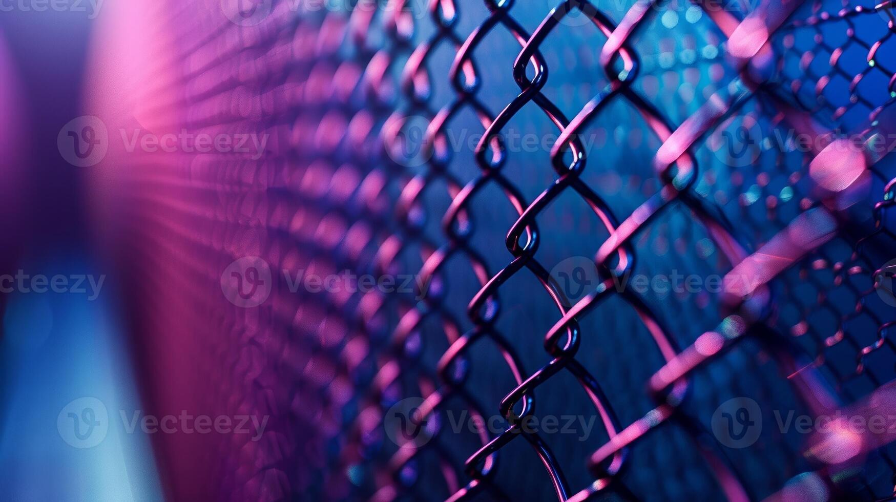 Detailed shot of a metal mesh with a gradient blue to purple background photo