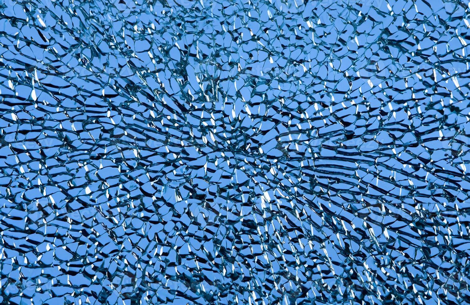 High-Resolution Close-up of Shattered Glass Surface, Abstract Background Texture photo