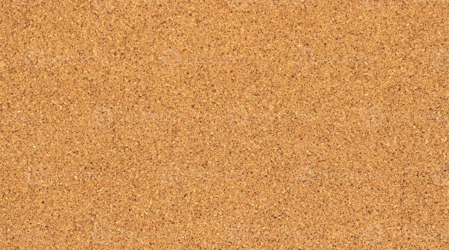 Close-Up Texture of Empty Cork Bulletin Board photo