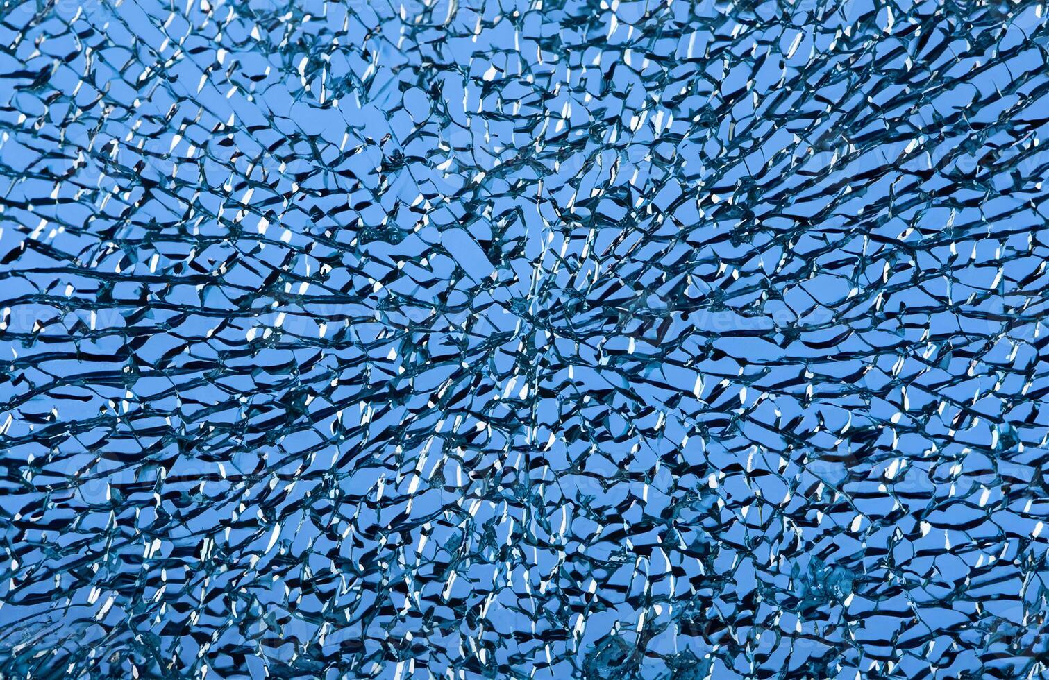 High-Resolution Close-up of Shattered Glass Surface, Abstract Background Texture photo