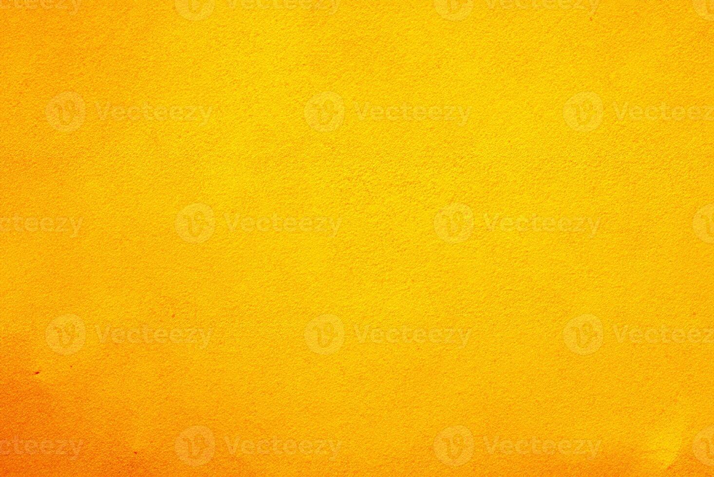 Vibrant Yellow Cement Wall Texture Background for Design Projects photo