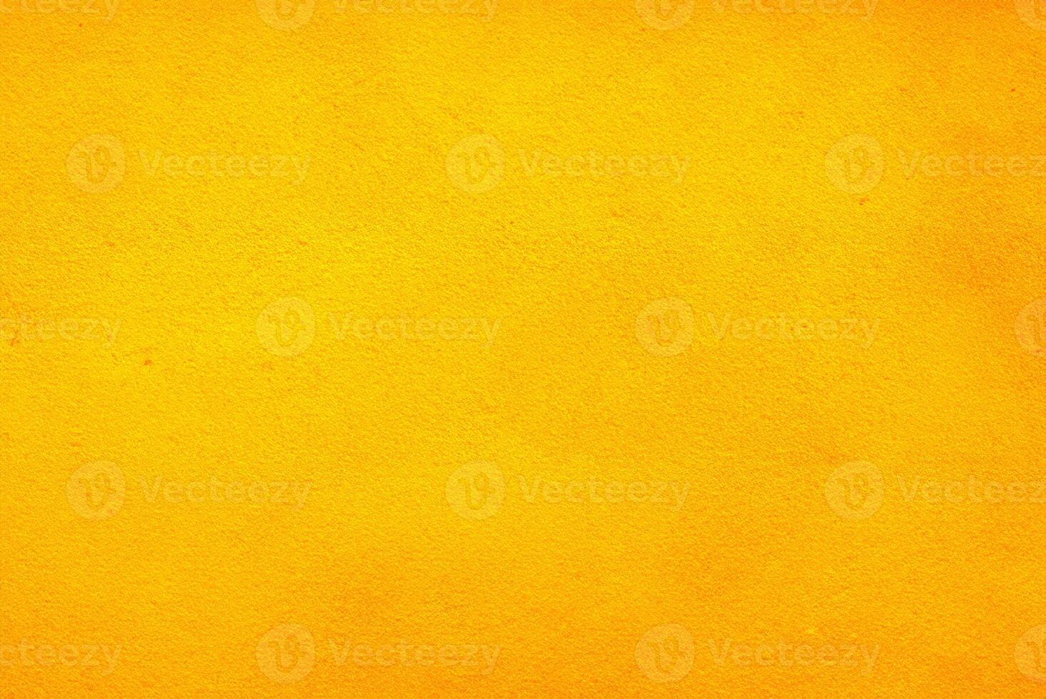 Vibrant Yellow Cement Wall Texture Background for Design Projects photo