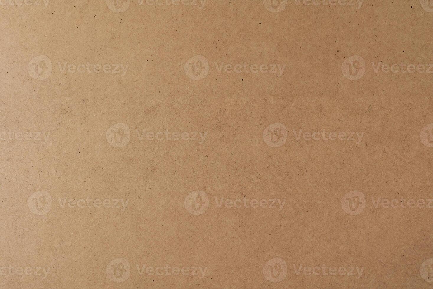 Horizontal Kraft Paper Texture Sheet on Cardboard Brown Background photo