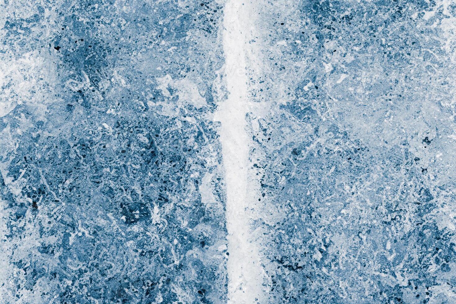 Frozen Ice Blocks Background in Blue Tones, Textured Frosty Surface photo