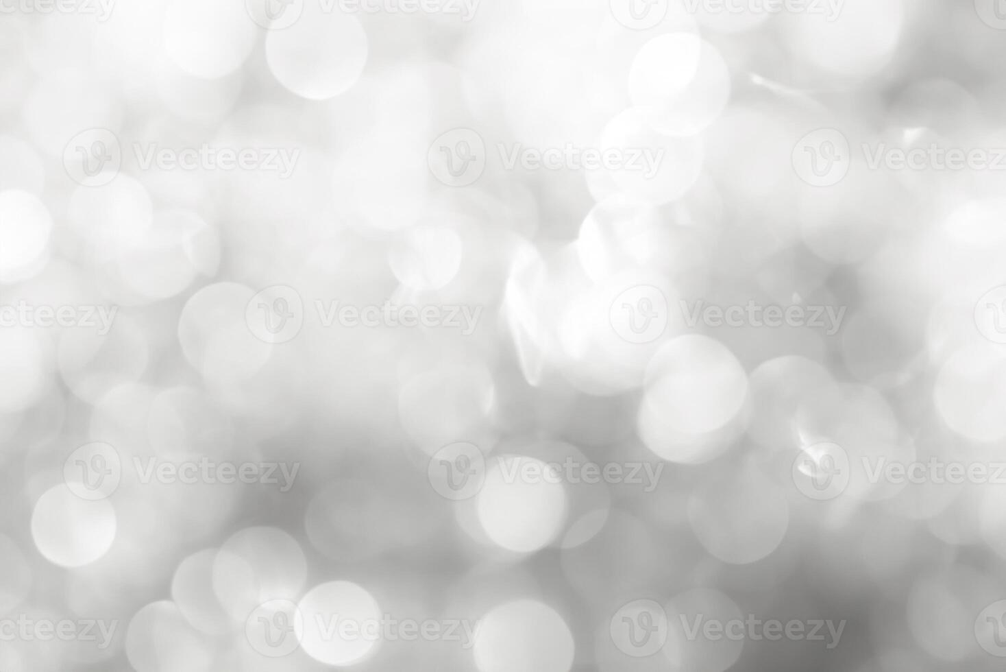White Abstract Background with Blurred Christmas Bokeh Lights photo