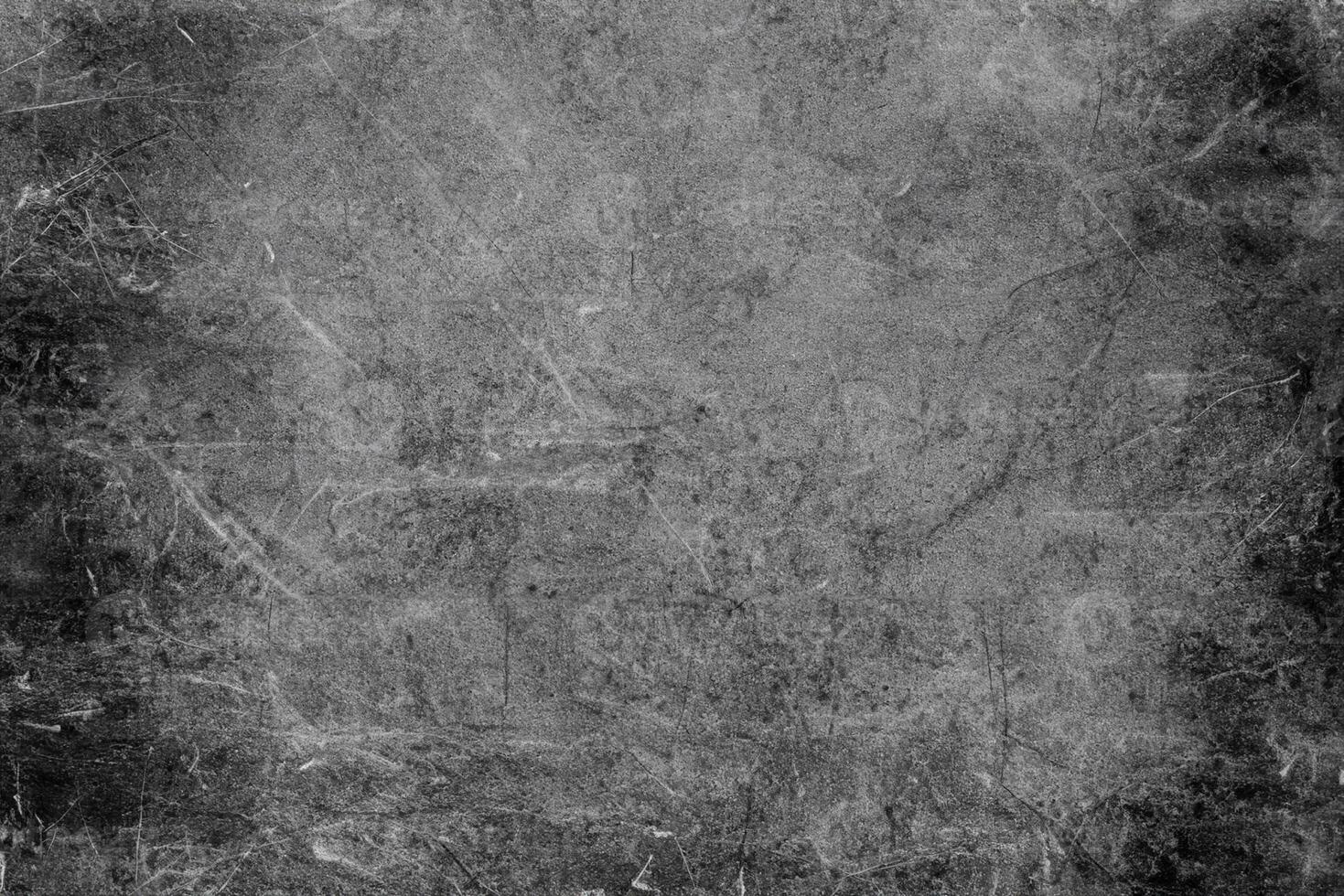 Textured Stone Surface with Scratches in Monochrome photo