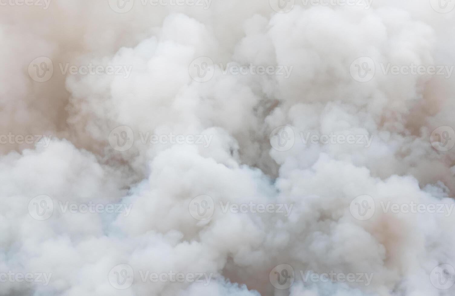 Dynamic Contrast, Close-Up of Swirling White and Billowing Black Smoke photo