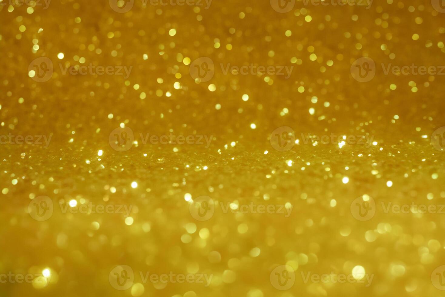 Glittering Gold Festive Background, Abstract Bokeh Lights and Falling Stars. Perfect for Winter Cards or Invitations. photo