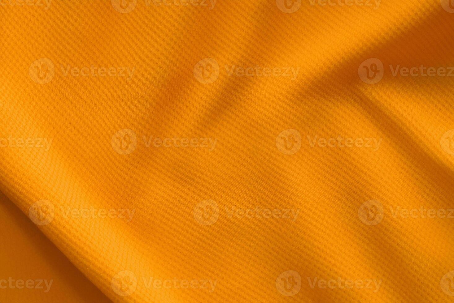 Top View Shot of Textured Orange Football Jersey Fabric photo