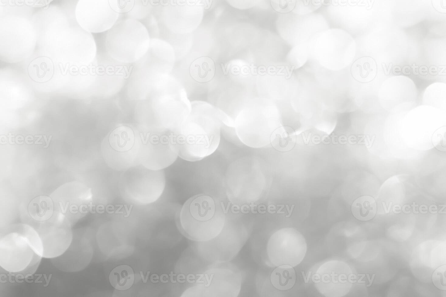 White Abstract Background with Blurred Christmas Bokeh Lights photo