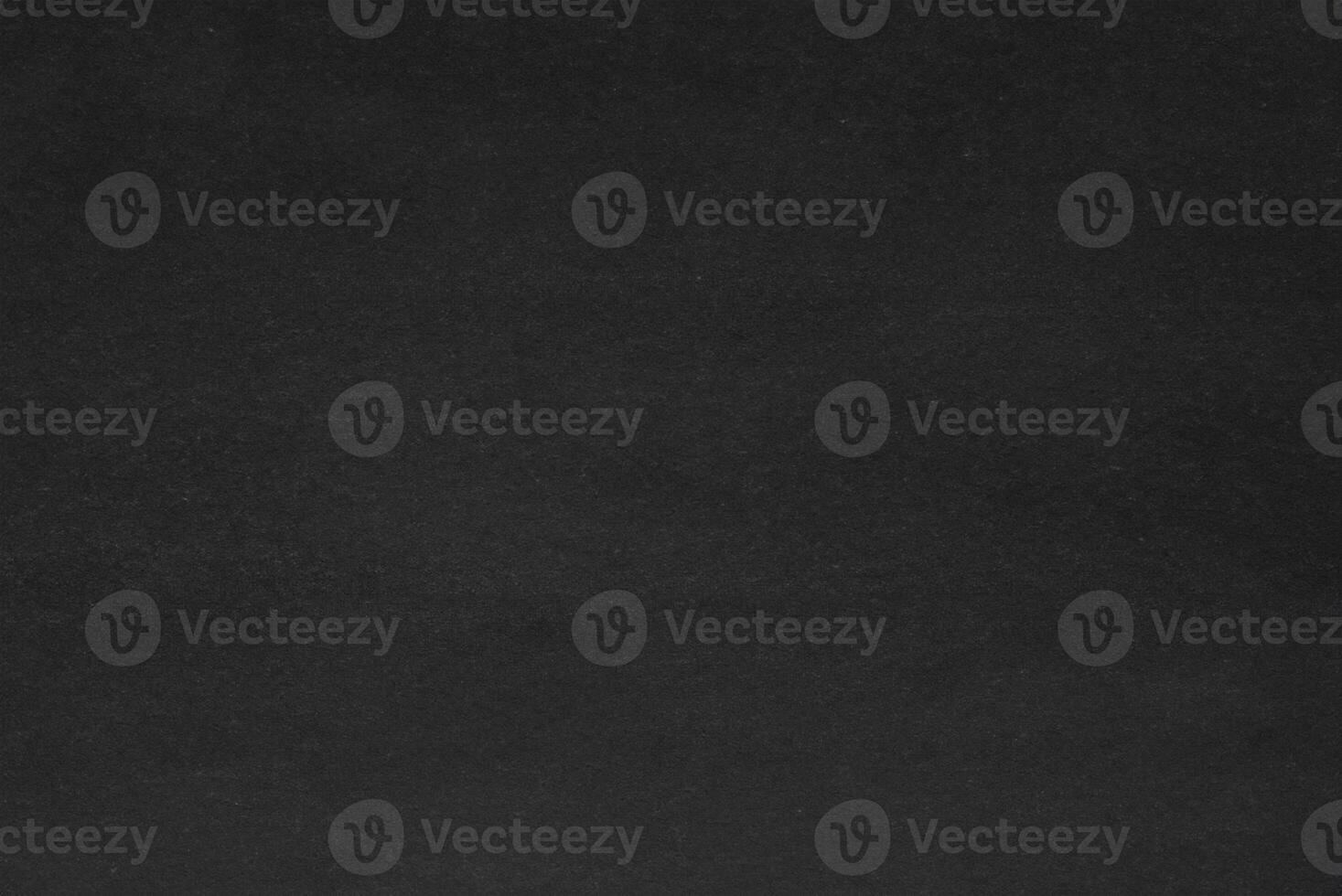 Dark Paper Texture with Spotlight on Dark Wall Background photo