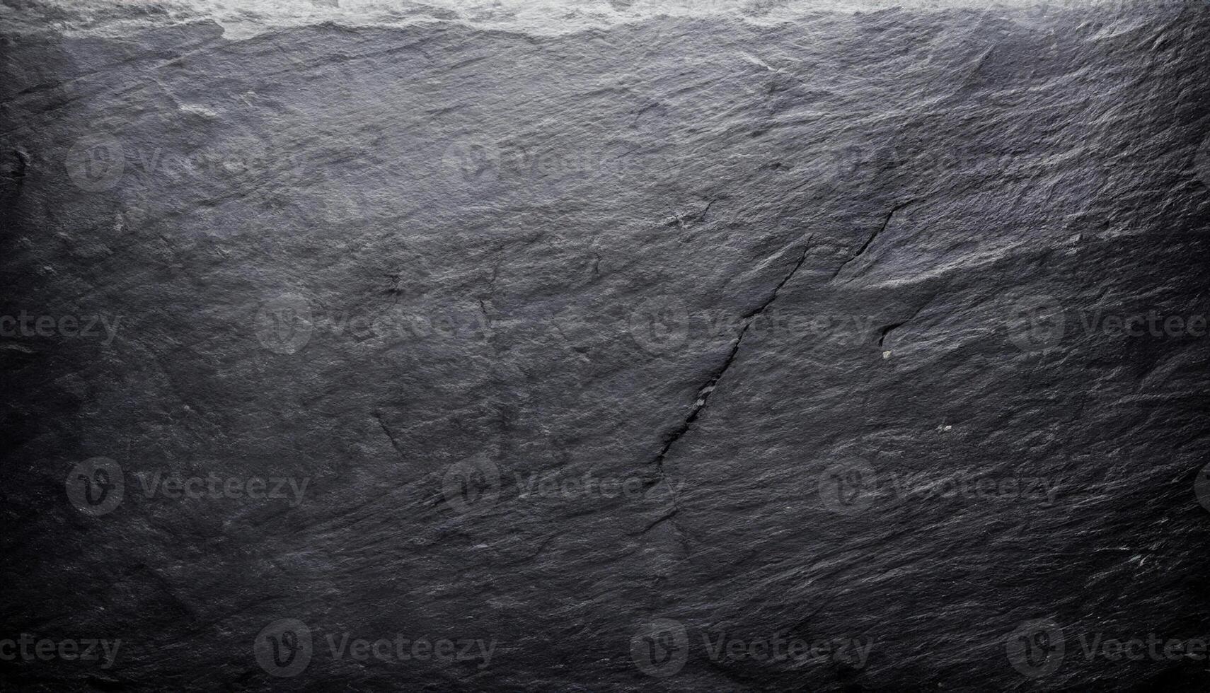 Slate Background Texture, Close-up of Polished Black Stone Surface photo