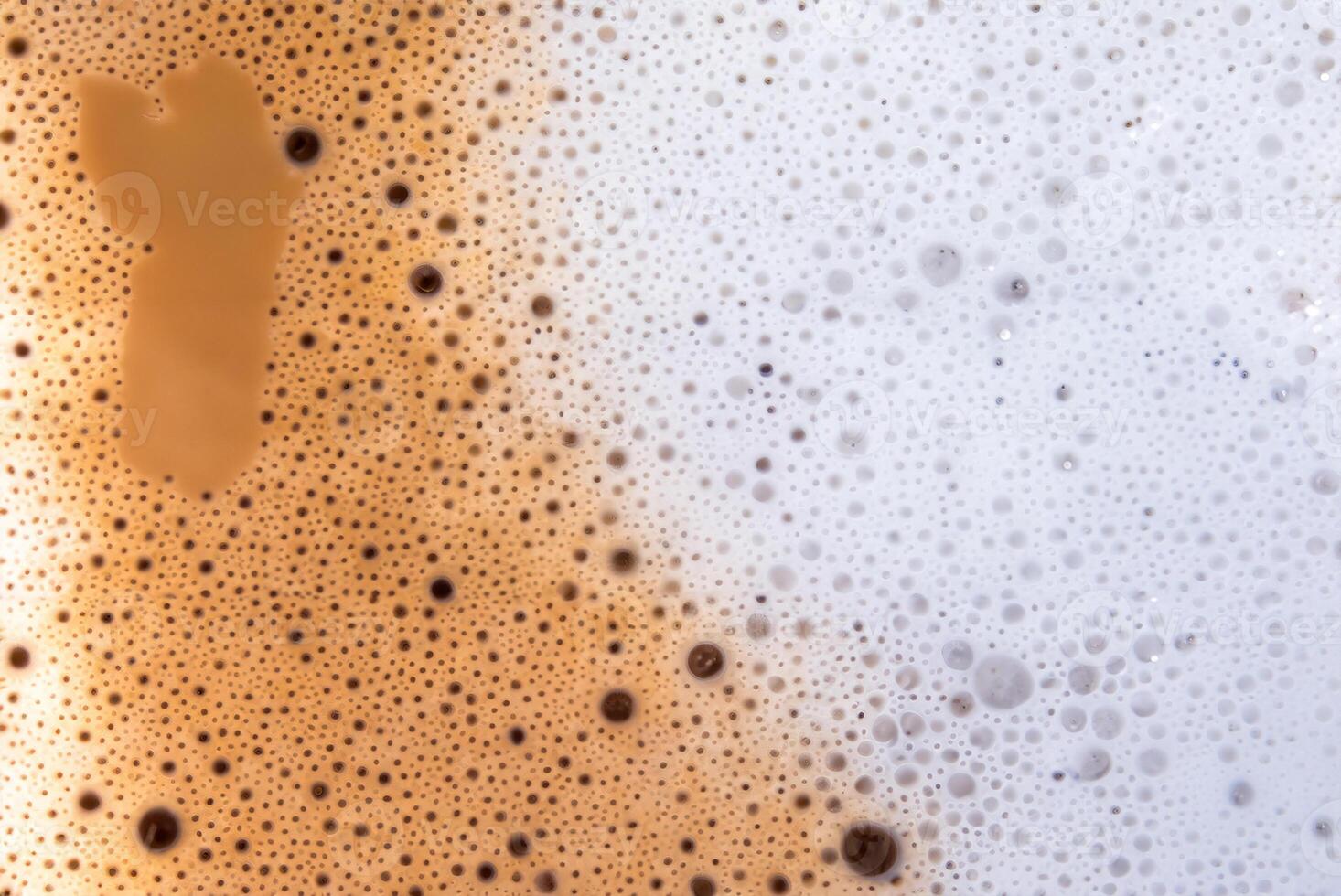 Close-up, Textured Hot Milk Coffee with Frothy Foam photo