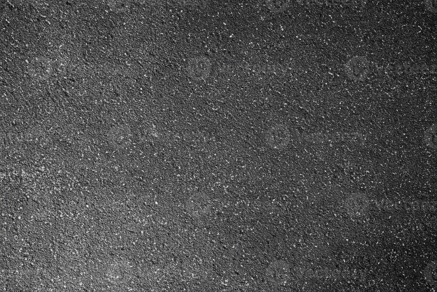 High-Resolution Image, Close-Up of Coarse Asphalt Surface Texture photo