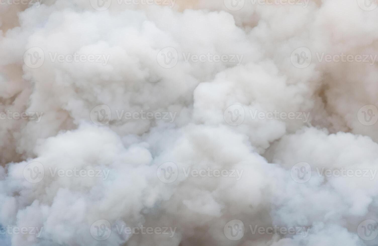 Dynamic Contrast, Close-Up of Swirling White and Billowing Black Smoke photo