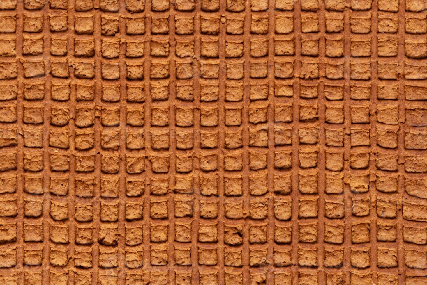 Close-up of Textured Brown Gingerbread, Symbolizing Festive Season Cooking and Holiday Celebrations photo