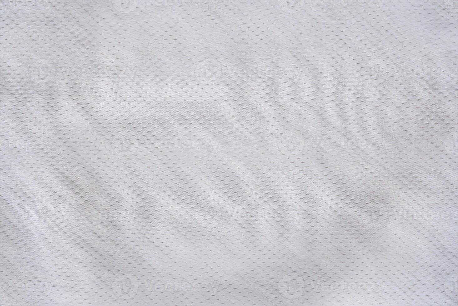 White Air Mesh Football Jersey on Fabric Background photo