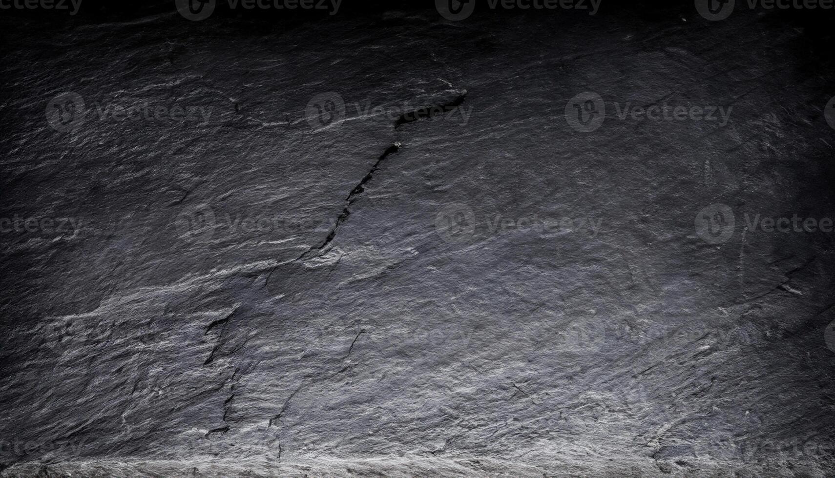 Slate Background Texture, Close-up of Polished Black Stone Surface photo