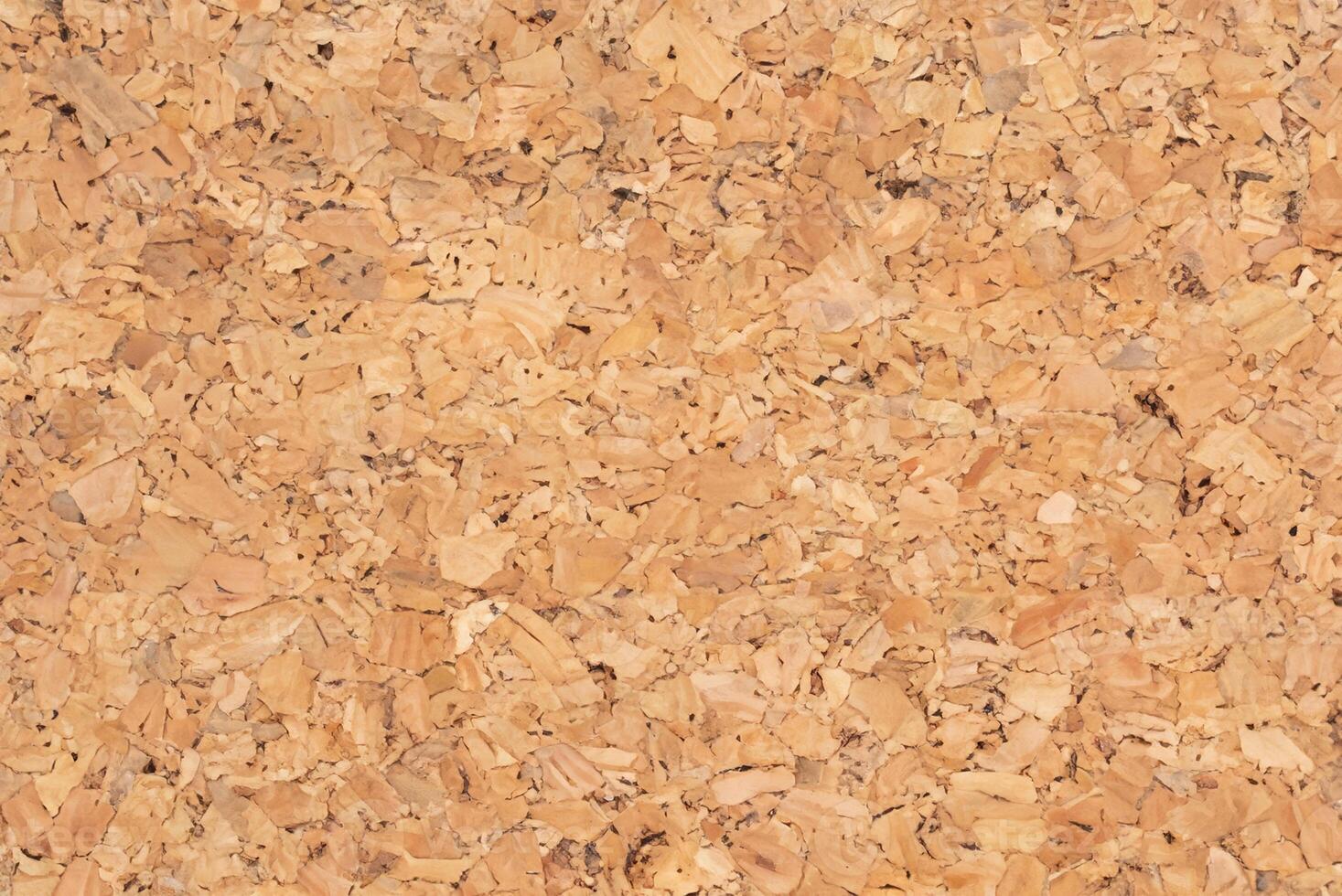 Textured Brown Corkboard Background photo