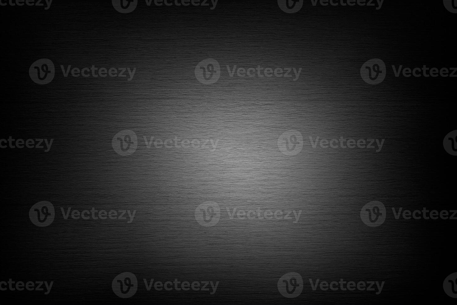 Crisp Image of Textured Black Stone Wall for Versatile Background Use photo