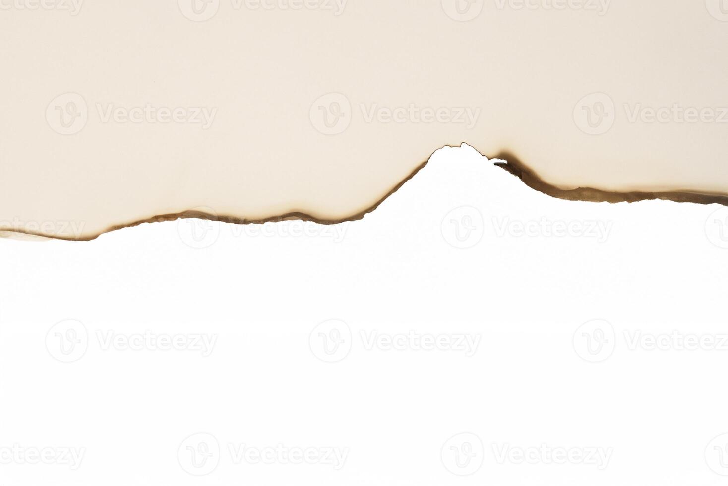 Close-up of Torn Paper with Burned Edge Texture photo