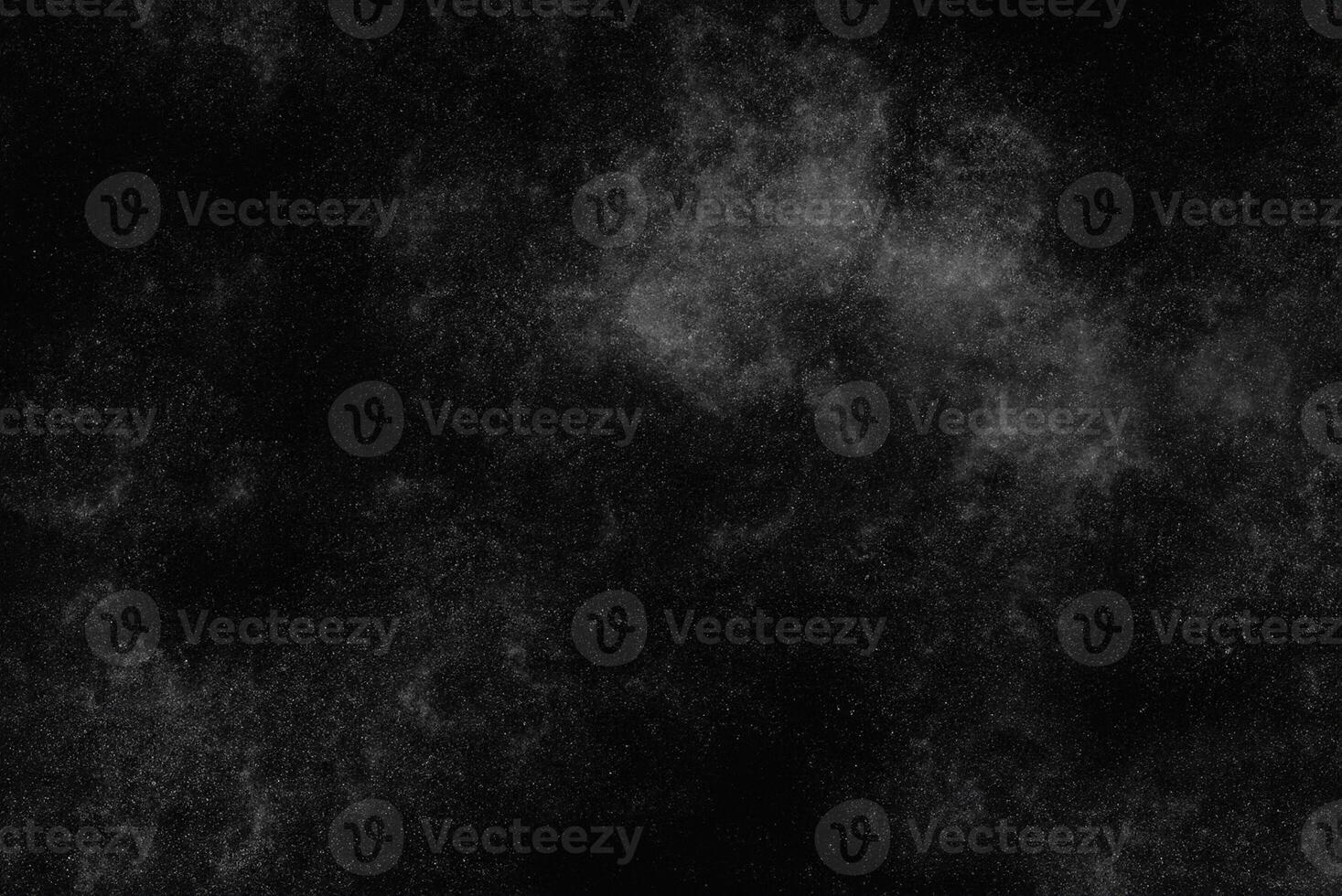 Monochrome Dust Overlay, Abstract Grunge Texture with Particle Effect, Isolated on Black Background photo