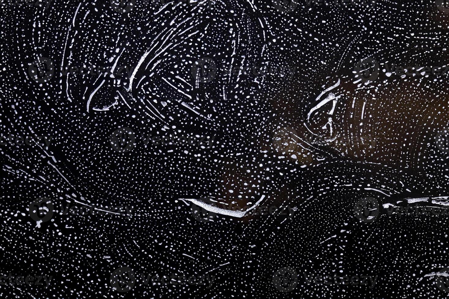 White Foam Texture of Detergent on Black Background photo