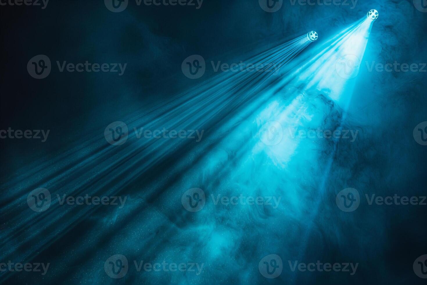 Mysterious Blue and White Light Beams on Dark Background photo