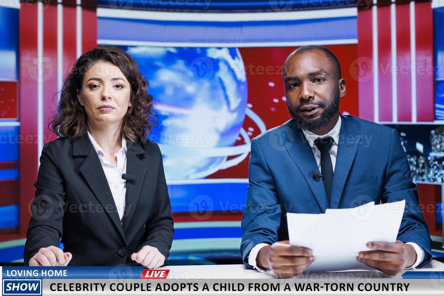 Reporters talking about famous couple adopting child from country at war, helping a kid to live normal life. Diverse journalists discuss about amazing gesture done by celebrities, morning show. photo