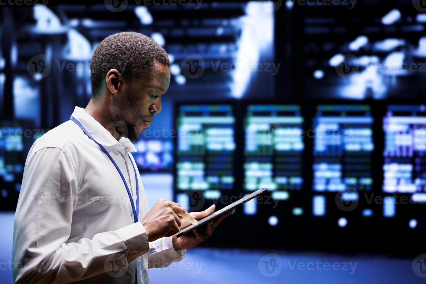 System administrator in server hub using renewable hydro energy sources to power cryptocurrency mining operations. Manager inspecting eco friendly supercomputers preventing environmental impact photo