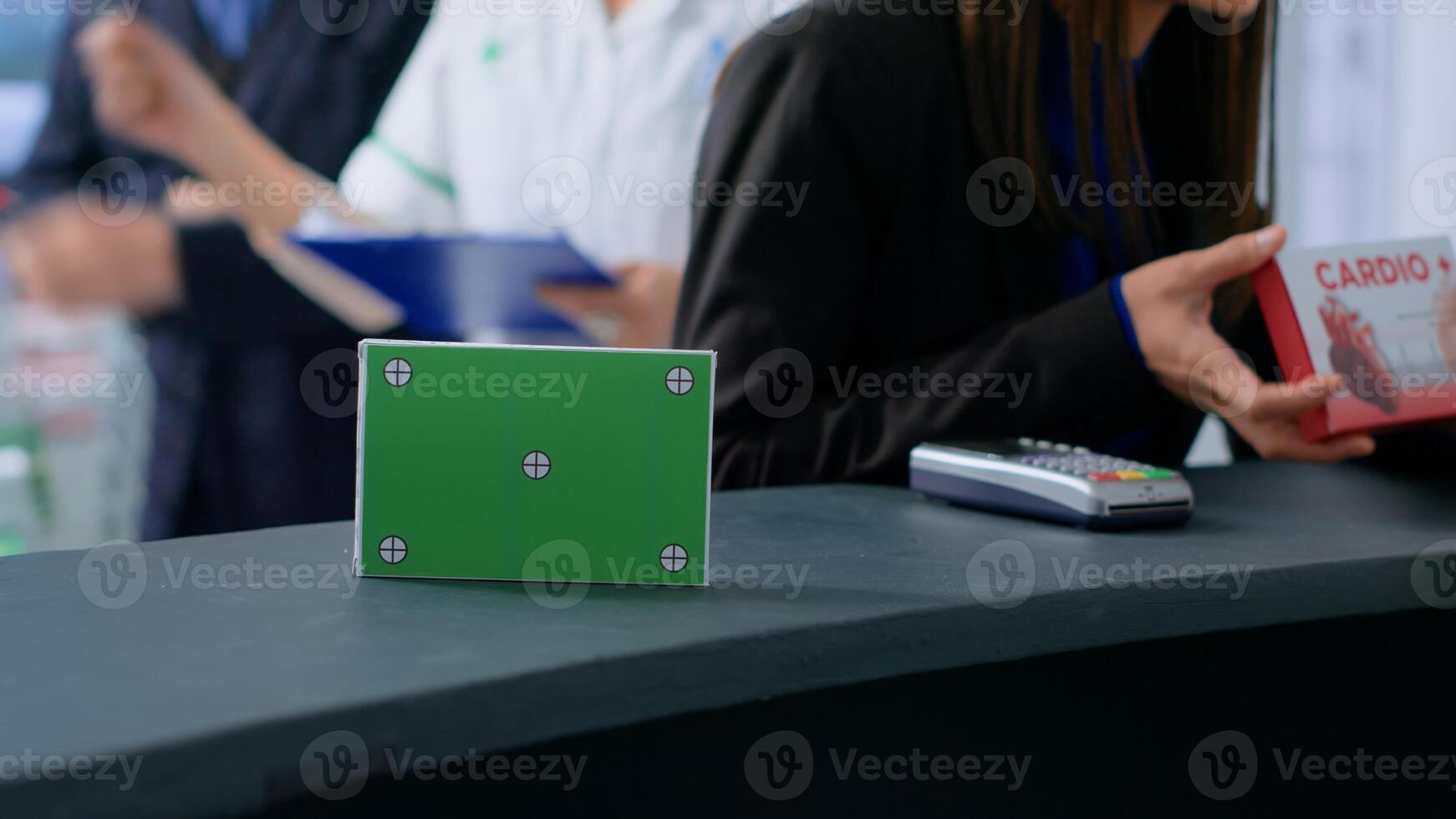 Close up shot of mockup packaged pharmaceutical product standing on apothecary counter, with customer in background purchasing illness treatment medication from professional pharmacist photo