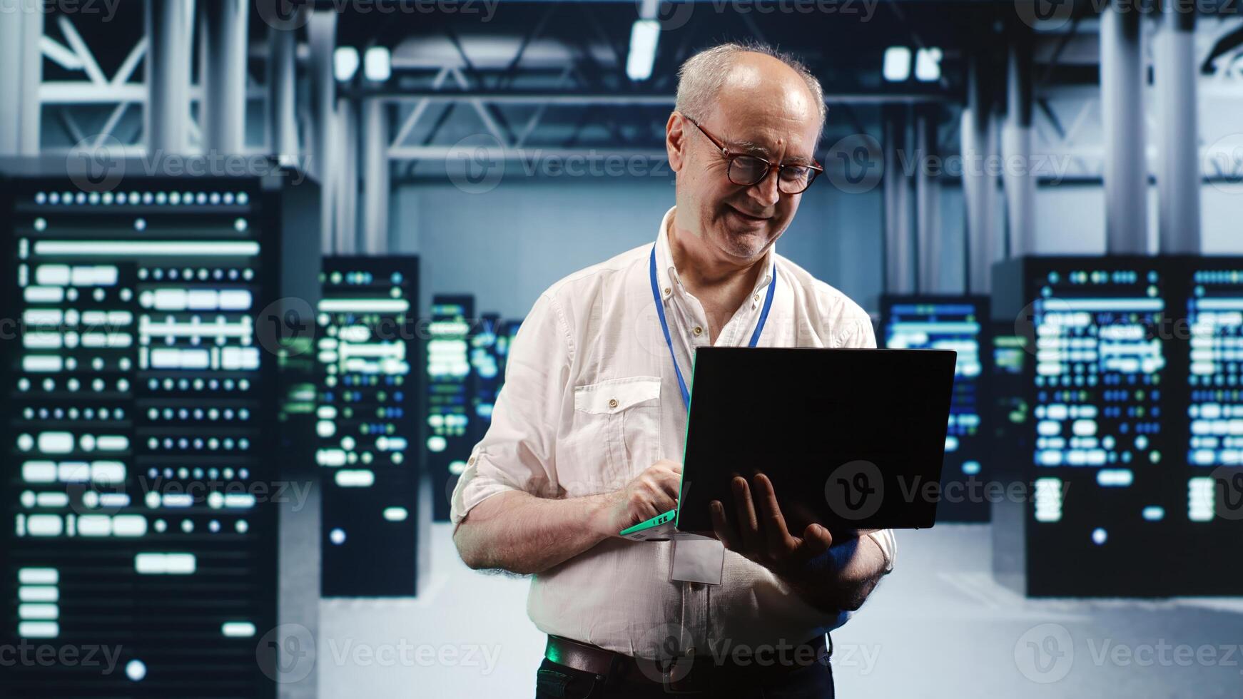 Capable serviceman expertly managing data while navigating in industrial server room. Proficient repairman in high tech facility ensuring optimal cybersecurity protection, optimizing systems photo