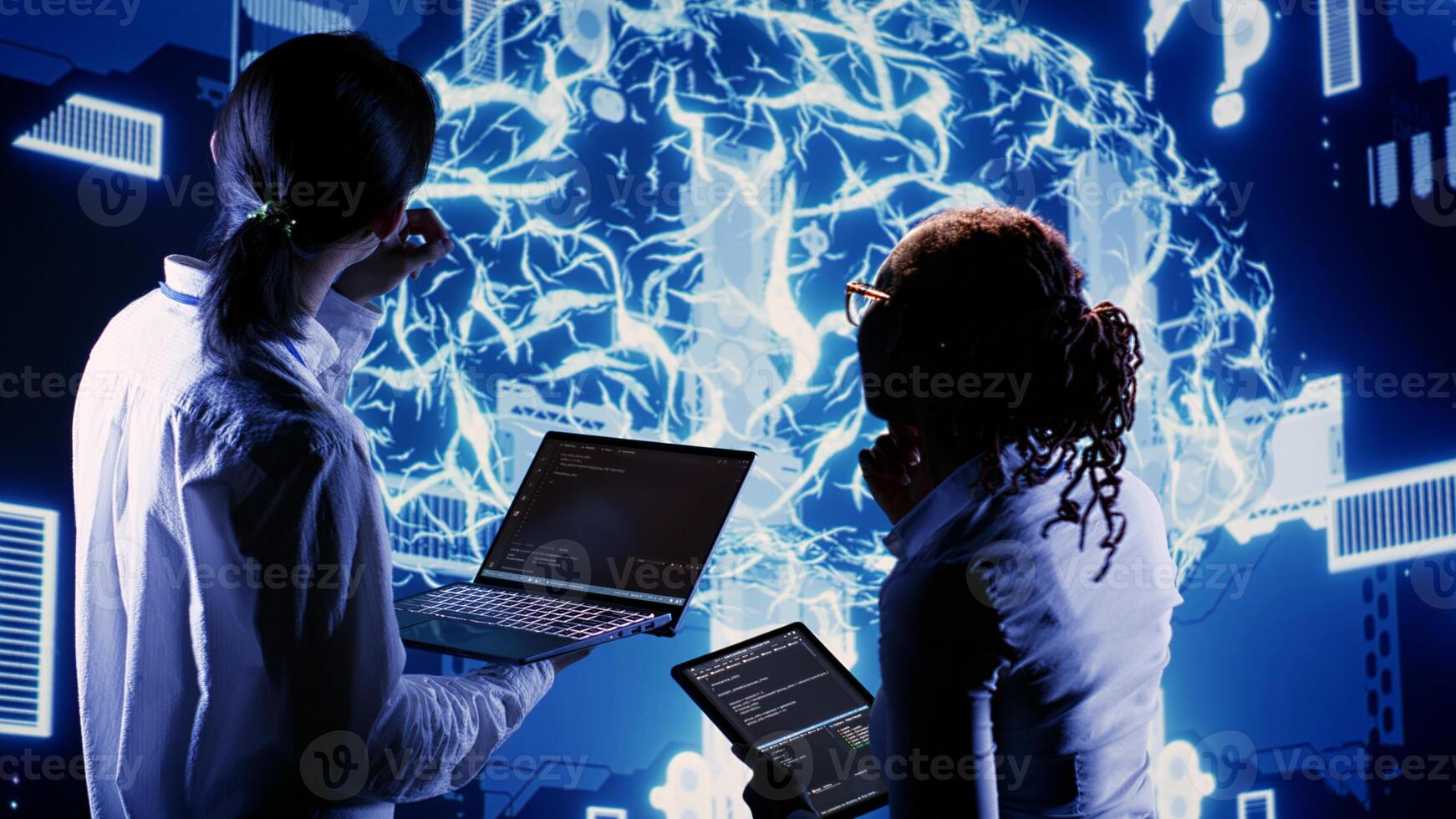 African american engineer and coworker develop artificial intelligence neural networks architecture inspired by human brain, setting up AI machine learning algorithms using programming code on laptop photo