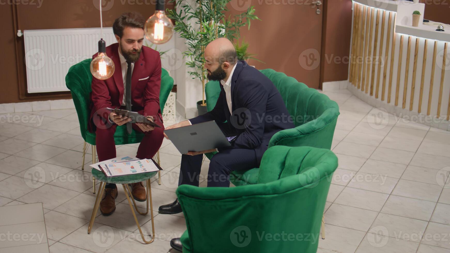 Associate establishing contacts with investor at global event, essential breaking point in development process. Partners going over modern ideas to guarantee ongoing collaboration. photo